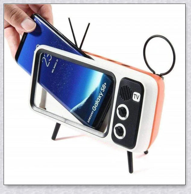 Retro TV-inspired phone stand with built-in Bluetooth speaker for hands-free entertainment and music playback