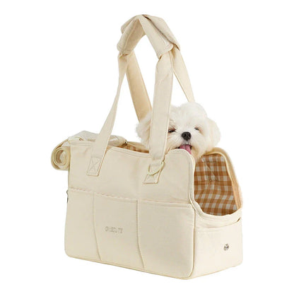 Portable One-Shoulder Pet Carrier Bag made of soft, breathable cotton for comfortable pet travel in the UK