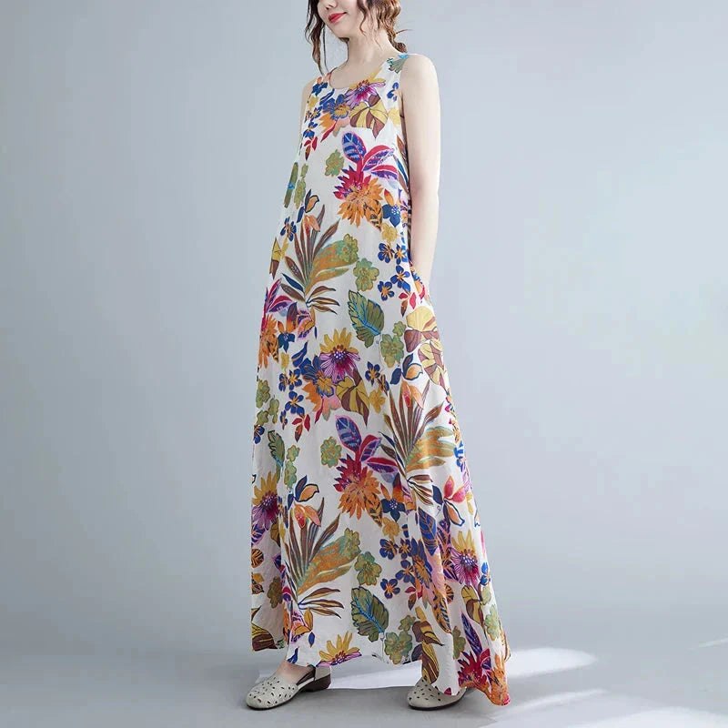 Elegant floral print cotton linen maxi dress in blue, perfect for warm weather wear
