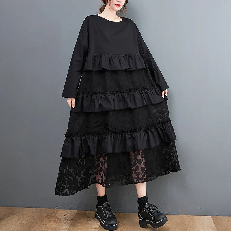 Stylish plus size dress in sophisticated black mesh fabric with wide waistline and long sleeves