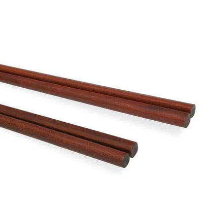 A set of four high-quality wooden chopsticks in a sleek, Japanese-inspired design