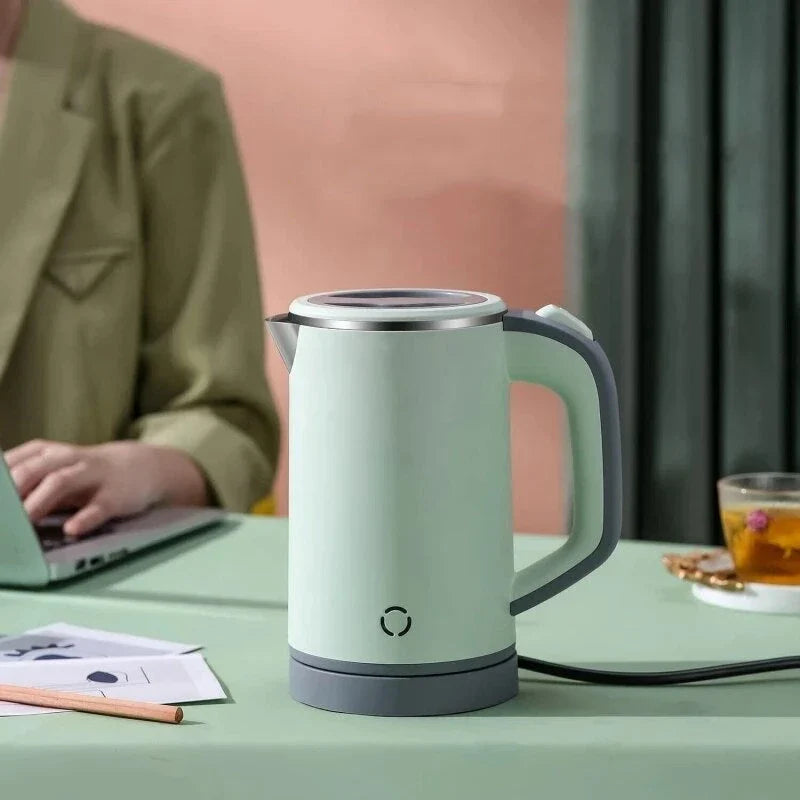 Compact stainless steel electric kettle with fast heating, cordless convenience, and durable construction