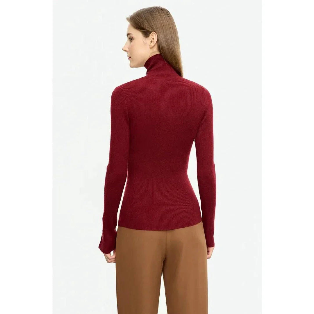Elegant, slim-fit turtleneck sweater in various colours with chic button detail, perfect for the modern British woman's autumn wardrobe