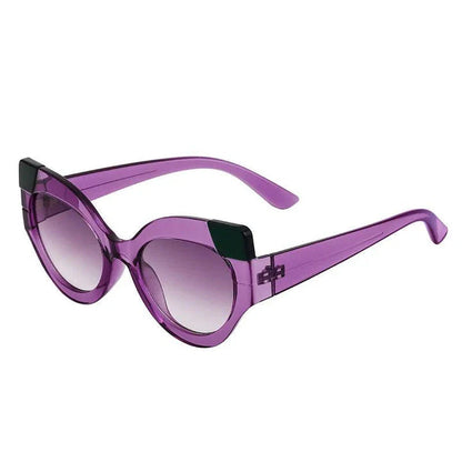 Iconic Cat Eye Retro Punk Sunglasses in black and gray, offering vintage charm and modern edge with UV400 protection