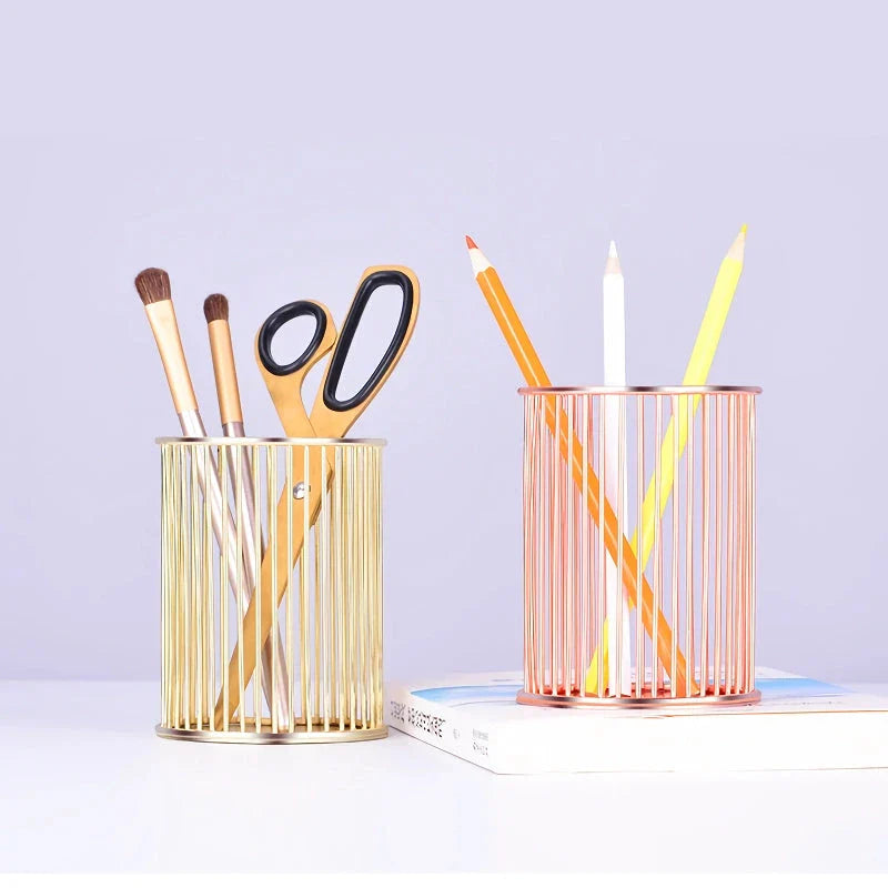 Elegant rose gold pen holder with hollow storage tube design for organising writing instruments, makeup brushes, and chopsticks