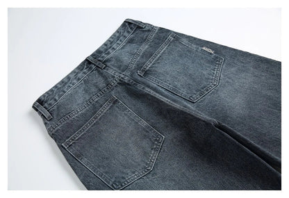 A pair of stylish retro-inspired Japanese jeans in black and grey, featuring a mid-rise waist and straight leg silhouette for a flattering, comfortable fit.