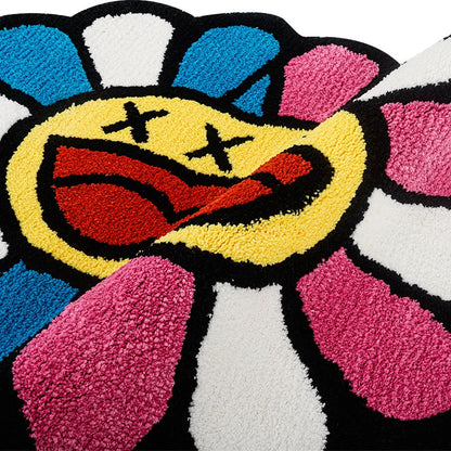 Cheerful smiling face tufted carpet in pink and blue colours, a plush and comfortable home decor item