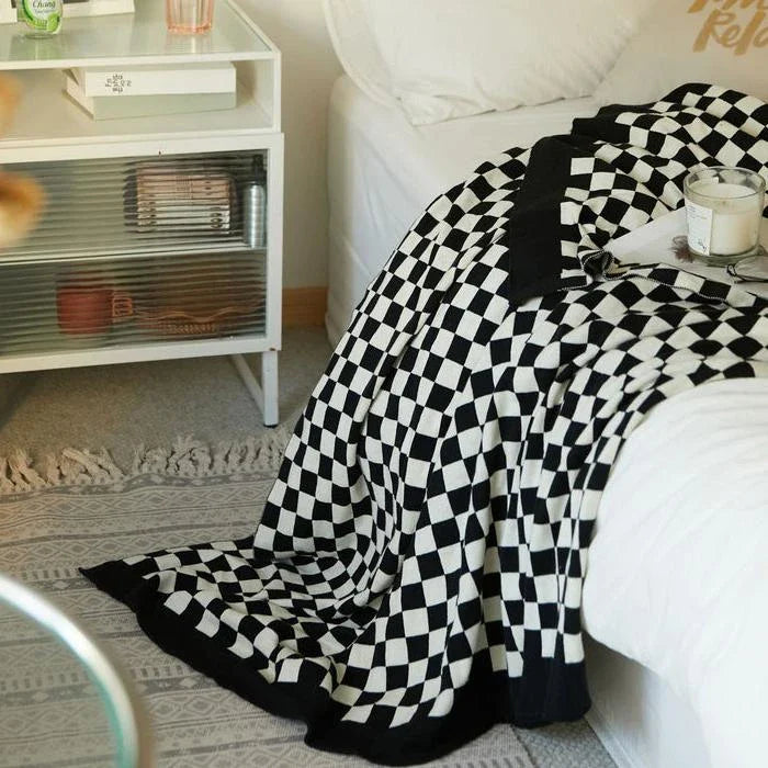Cosy tartan check cotton knit throw blanket in earthy tones for stylish home decor