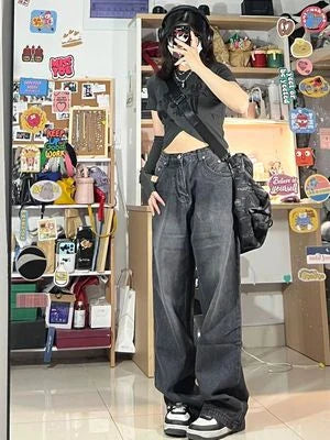 Women's high-waist, wide-leg black denim jeans with multiple pockets and vintage-inspired wash
