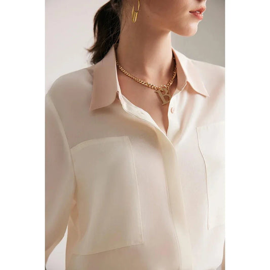 Refined Mulberry Silk Crepe de Chine Blouse in White, Ivory, Navy, and Black colours, featuring elegant patchwork design and turn-down collar for versatile office and casual wear.