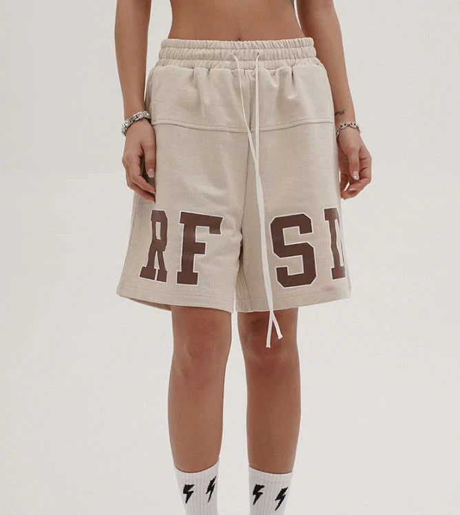 Premium loose-fit sports shorts with eye-catching printed patterns in black, khaki, and dark grey colours