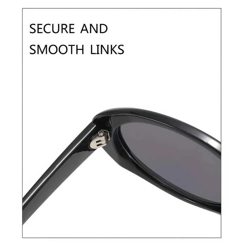 Oval-shaped women's sunglasses in a white and grey colour, offering UV protection and a stylish, retro-inspired design.
