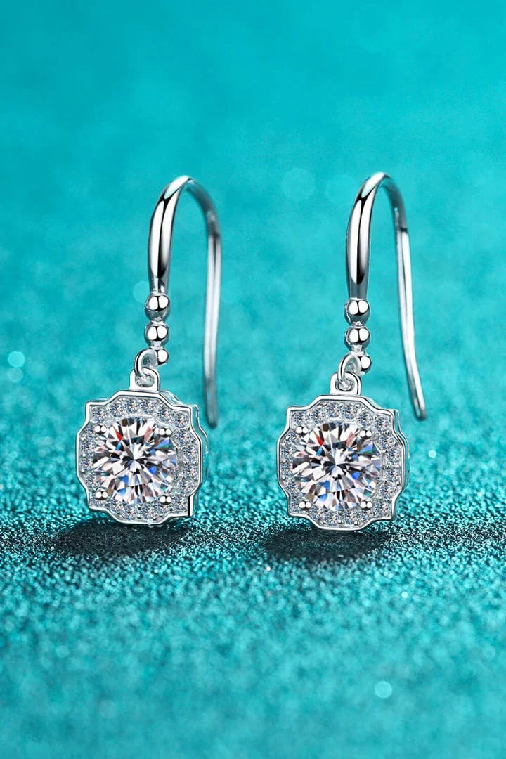 Pair of 925 sterling silver earrings featuring sparkling moissanite stones and zircon accents