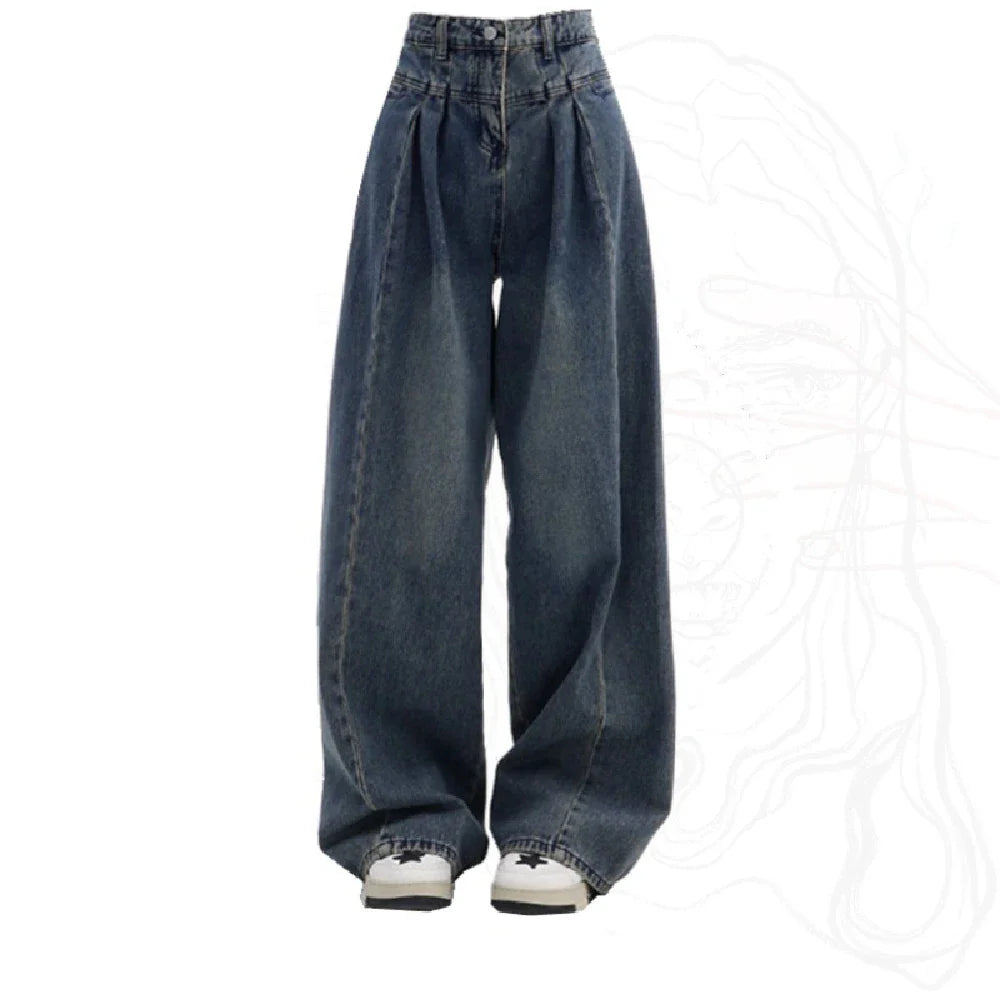Relaxed fit wide-leg denim trousers in a classic blue colour, featuring a high-waisted design for a flattering fit.