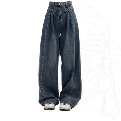 Relaxed fit wide-leg denim trousers in a classic blue colour, featuring a high-waisted design for a flattering fit.