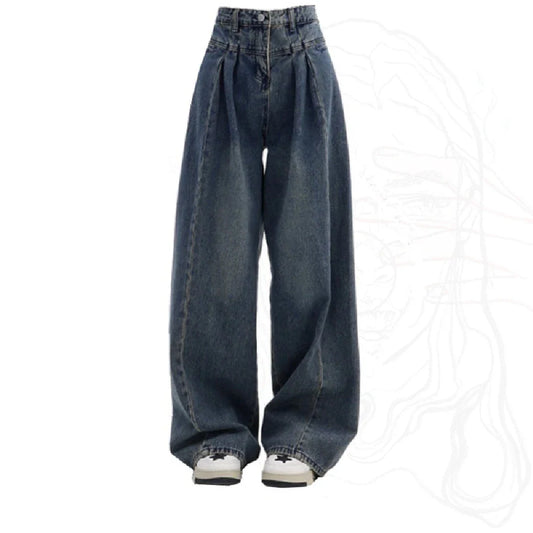 Relaxed fit wide-leg denim trousers in a classic blue colour, featuring a high-waisted design for a flattering fit.