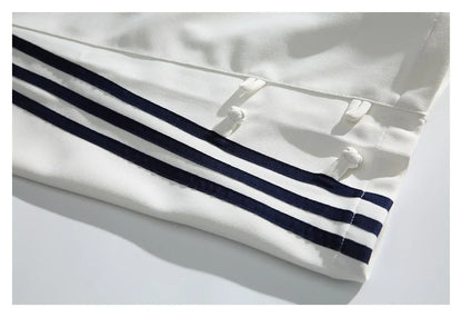 Stylish striped sports trousers in a relaxed, mid-waist design for versatile leisure and athletic wear
