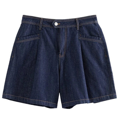 Dark denim high-waist loose shorts with retro pleated design, offering comfort and style for the modern British woman.