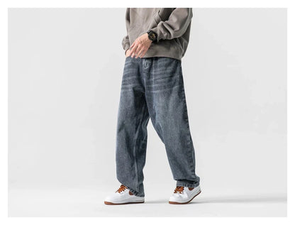 A pair of stylish retro-inspired Japanese jeans in black and grey, featuring a mid-rise waist and straight leg silhouette for a flattering, comfortable fit.