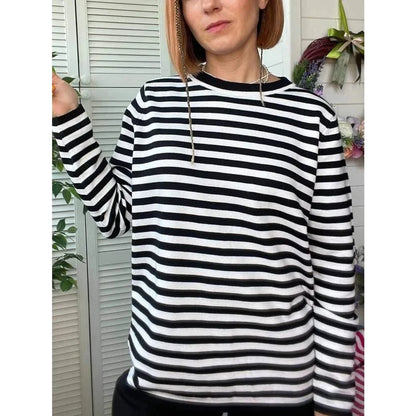 Autumnal knitted stripe jumper in a casual, relaxed style suitable for women during the autumn and winter seasons