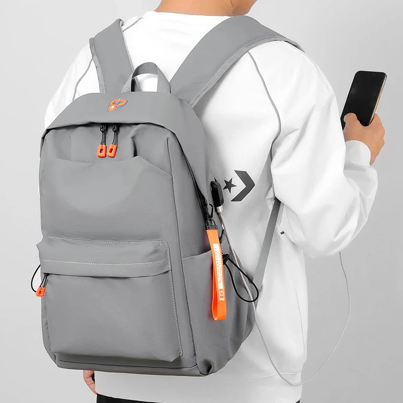 Premium casual laptop rucksack with adjustable, padded shoulder straps and dedicated laptop compartment for men's travel