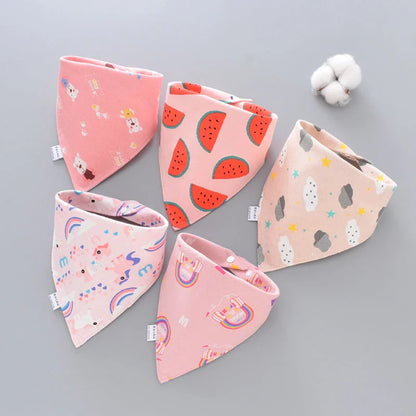 Stylish cotton baby bandana bibs in various fashionable prints, designed to keep your little one dry and comfortable.