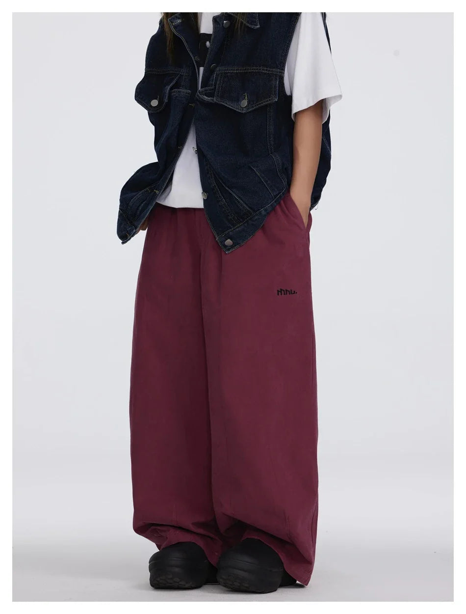 Sophisticated men's casual trousers in various colours, featuring a tailored straight-leg design and mid-rise waistline for a polished, British-inspired look.
