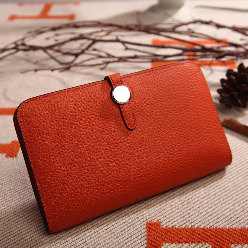 Premium cowhide leather wallet with luxurious lychee pattern design, featuring multiple compartments for secure storage and organisation.