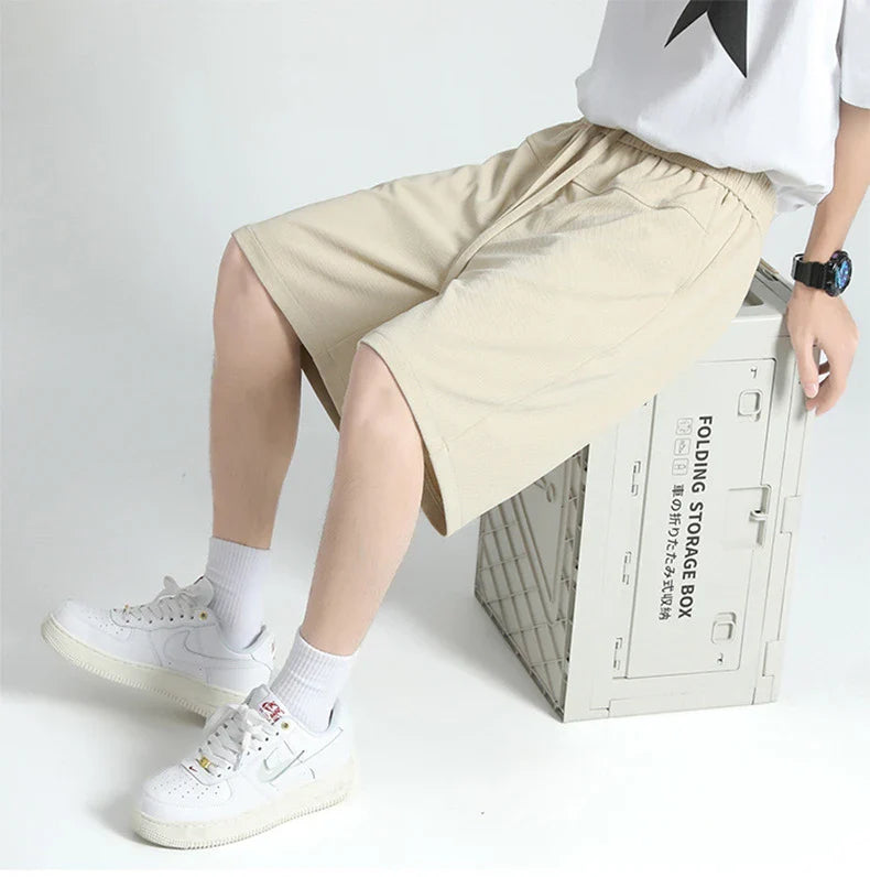 Premium straight-fit drawstring trousers in white, khaki, and black colours for stylish British men
