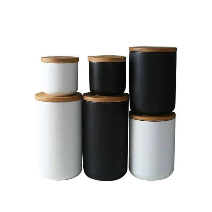 Elegant ceramic storage jars with airtight lids, available in small, medium, and large sizes for versatile kitchen organisation.