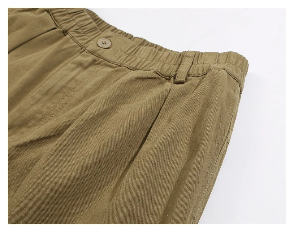 Sophisticated men's casual trousers in various colours, featuring a tailored straight-leg design and mid-rise waistline for a polished, British-inspired look.
