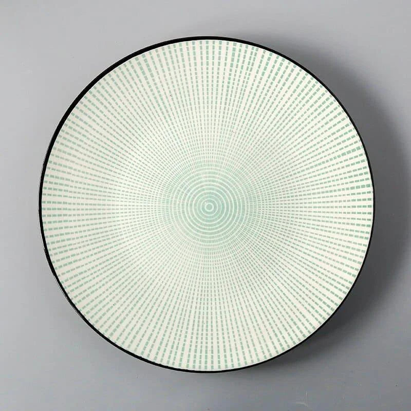 Elegant ceramic plates with vibrant, whimsical prints in a variety of enchanting designs