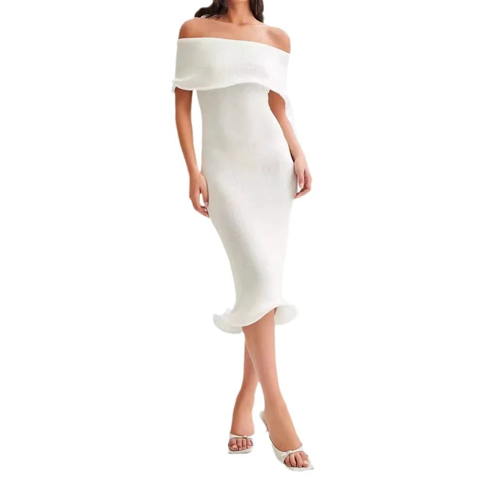 Chic white sleeveless dress with slim-fit silhouette, perfect for stylish occasions in the UK