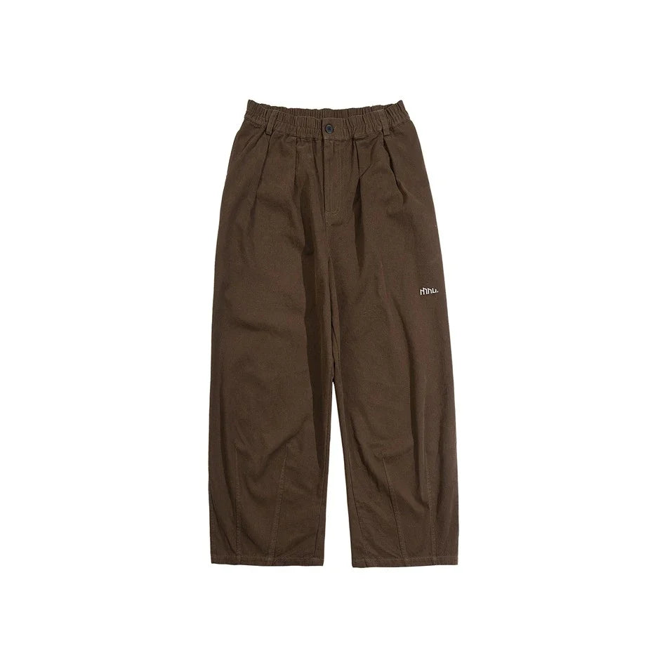 Sophisticated men's casual trousers in various colours, featuring a tailored straight-leg design and mid-rise waistline for a polished, British-inspired look.