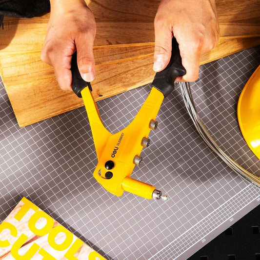 Premium 10.5-inch single-handed rivet gun for DIY projects, made of durable chromium-molybdenum alloy steel with a comfortable coated handle.