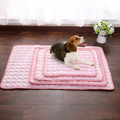 A stylish pet cooling pad featuring a blue ice silk surface and a breathable mesh backing, designed to keep pets cool and comfortable during hot summer days.