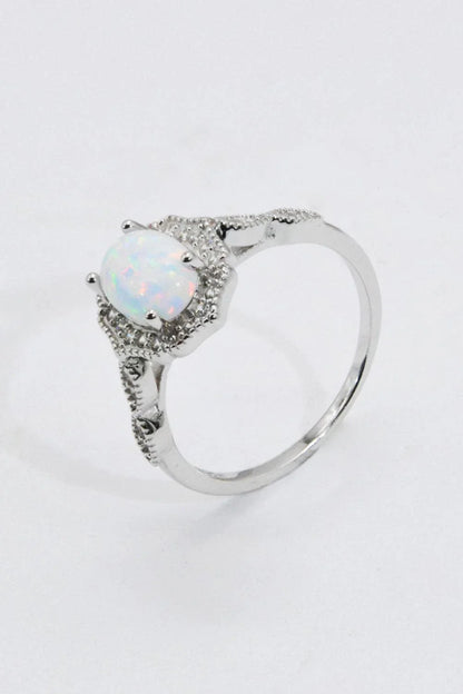 A stunning platinum-plated opal ring made from 925 sterling silver, featuring a modern and minimalist design