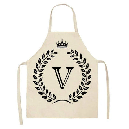 A high-quality kitchen apron featuring a charming crown and letter print design in a premium cotton and linen blend fabric.