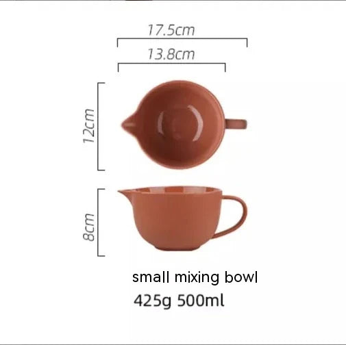 Premium porcelain mixing bowl with ergonomic handle and pointed drainage design for easy baking at home