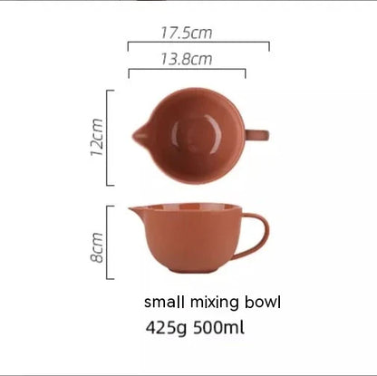 Premium porcelain mixing bowl with ergonomic handle and pointed drainage design for easy baking at home