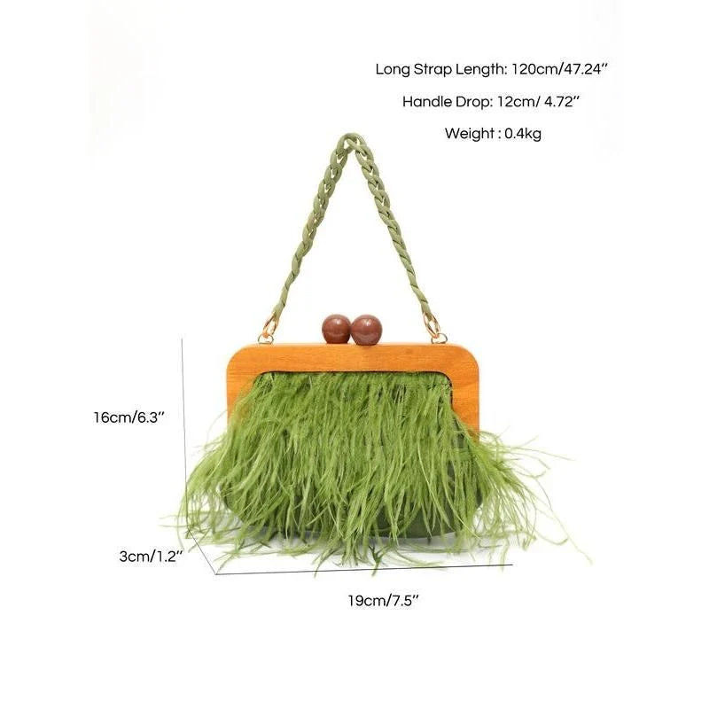 Luxury feather evening clutch with elegant acrylic chain decoration in green colour