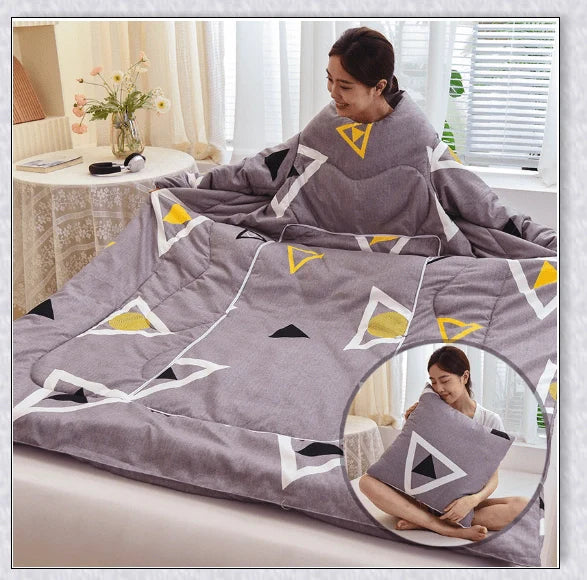 A cosy, wearable quilt with sleeves in a variety of colourful designs, perfect for staying warm and comfortable during the winter months.