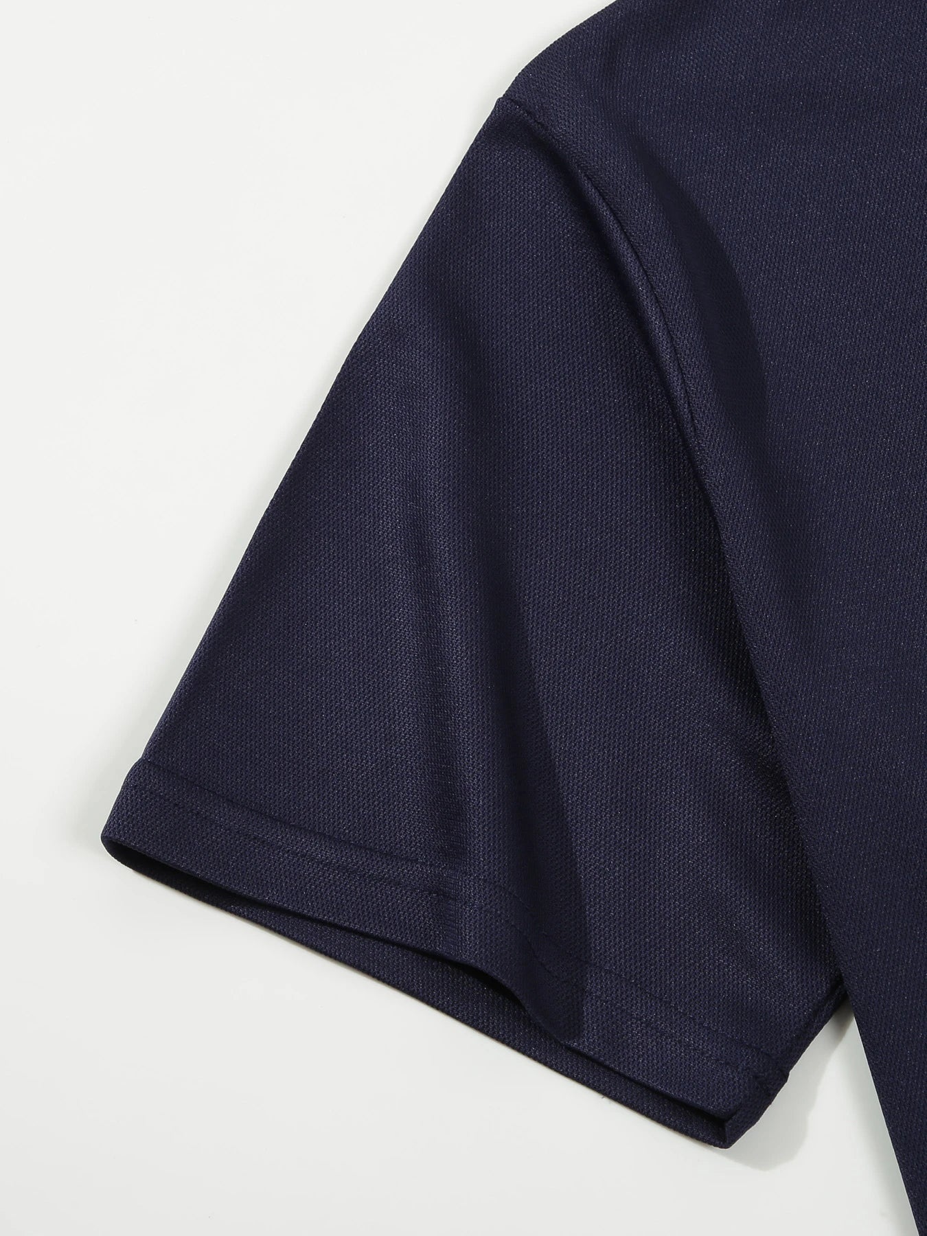 Premium short-sleeve sports shirt for men, featuring a button-down design and breathable, durable polyester fabric