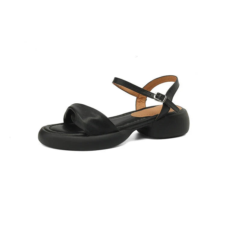Premium leather chunky heel sandals in black with adjustable buckle strap for comfortable, stylish summer wear