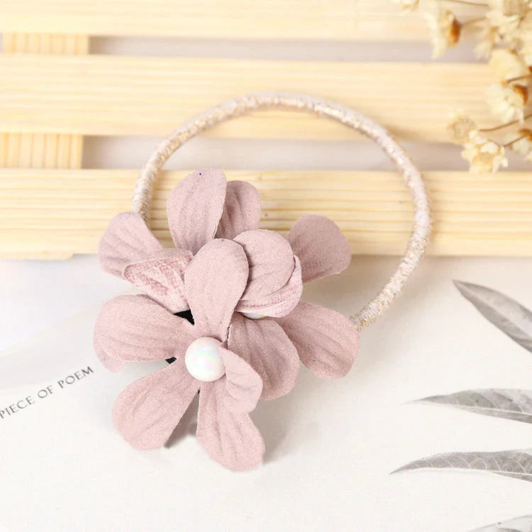 Stylish floral elastic hair rope with a secure hold and comfortable design, perfect for everyday wear