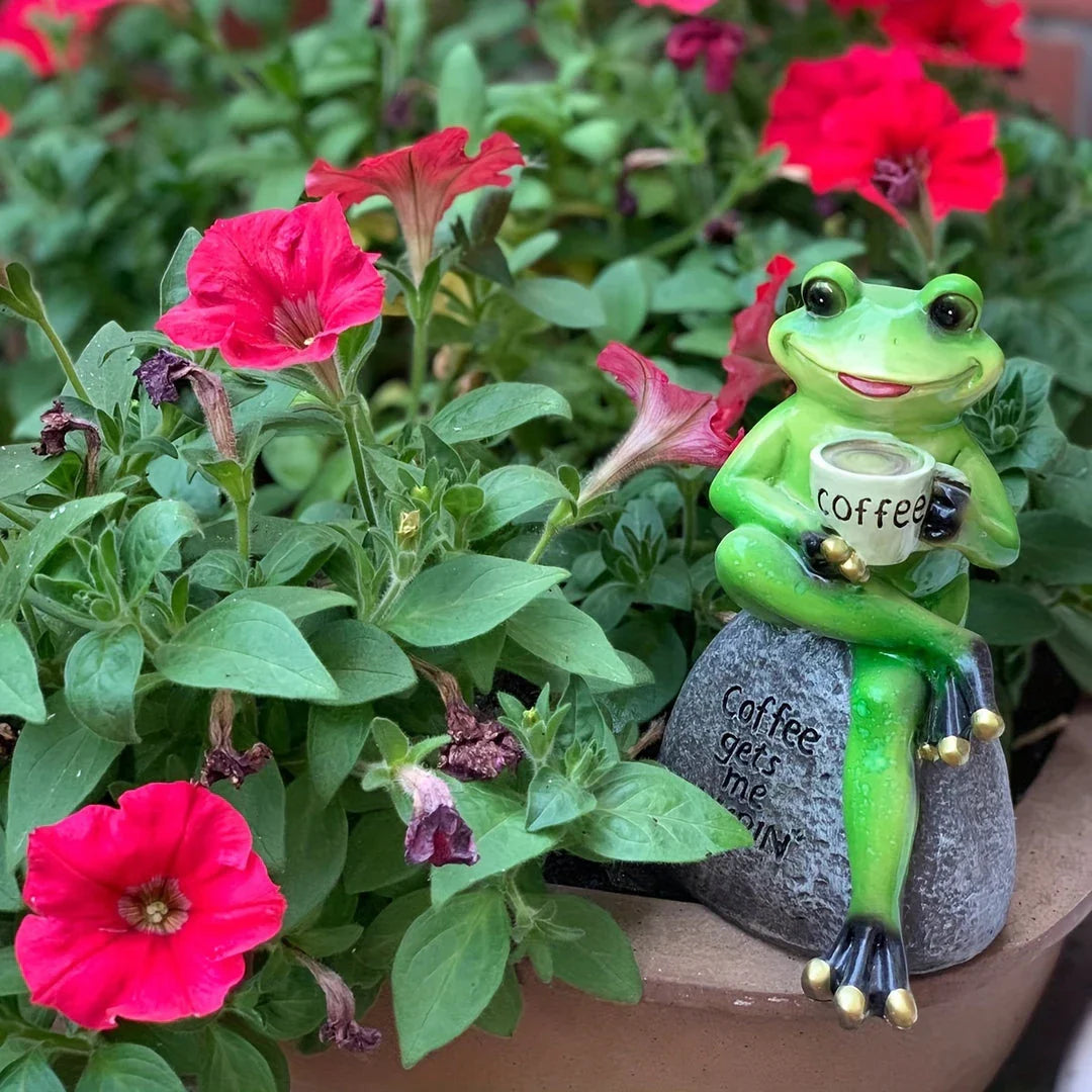 A charming resin frog statue with a playful design, perfect for adding a touch of whimsy to your garden or patio decor.