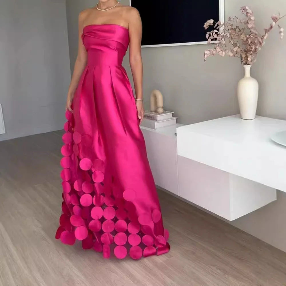 Elegant patchwork satin dress with sleek tube top, high-waist silhouette, and full-length swing skirt in vibrant rose red colour