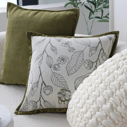 Luxurious cream and green jacquard cushion cover with a unique pattern, measuring 45 x 45 cm for a generous size and impactful presence.