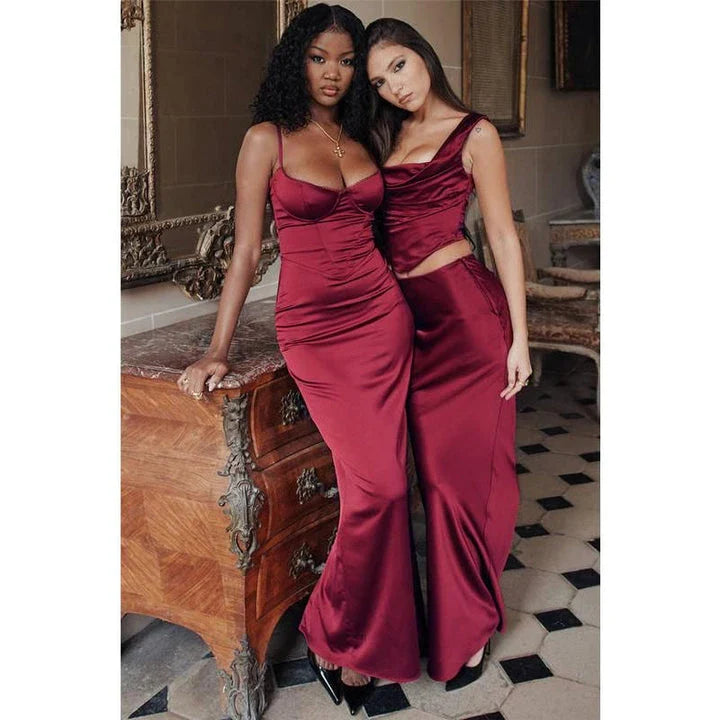 Elegant satin two-piece skirt set featuring a backless crop top and ankle-length skirt in a rich wine colour
