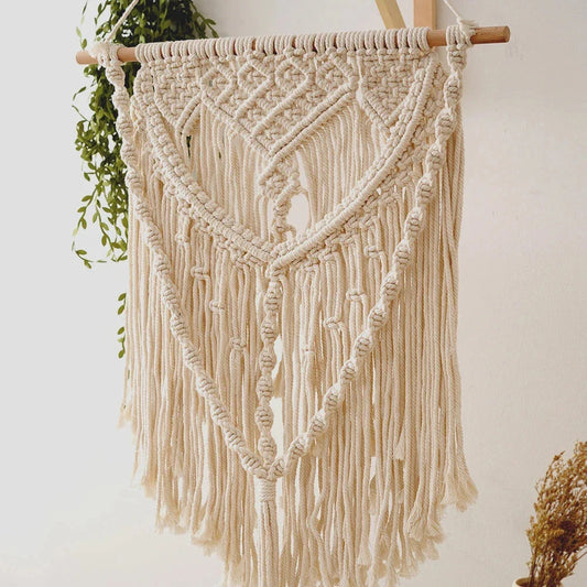 Elegant beige minimalist tapestry with unique oval shape and solid pattern, perfect for modern home decor